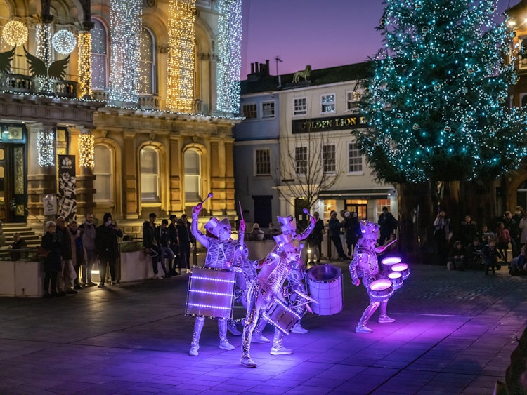 Christmas lights and performance outside the town hall in Ipswich
